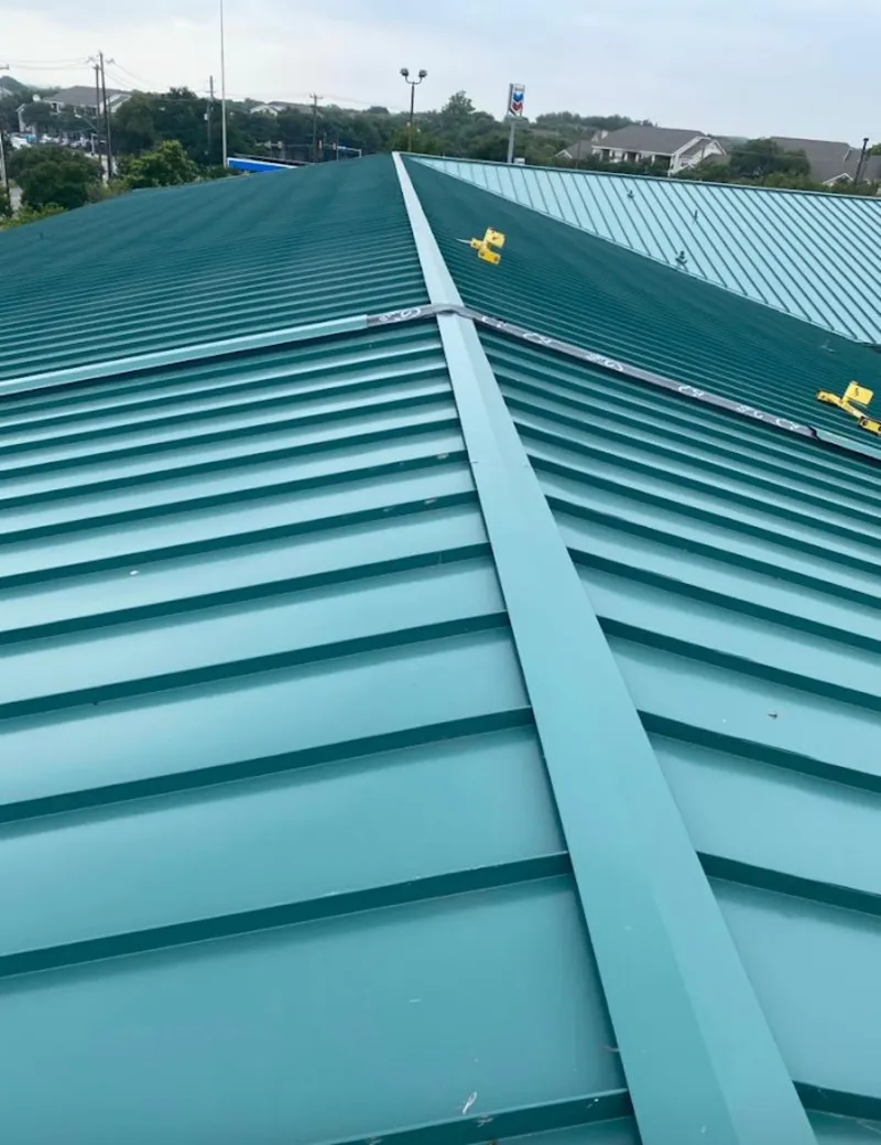 Green commercial metal roof ridge and valley for Metal Roof Repair in Edmond